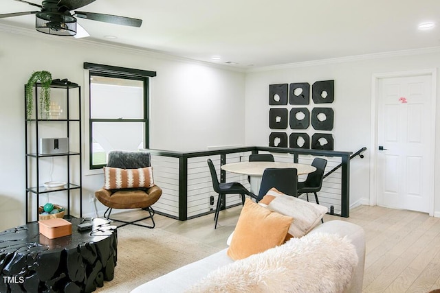 1523 Ivy Ln, Raleigh, NC 27609 - living room featuring crown molding, wood finished floors, a ceiling fan, and recessed lighting