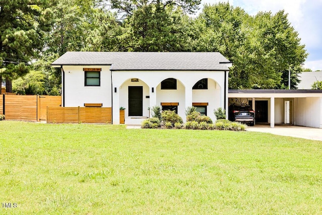 1523 Ivy Ln, Raleigh, NC 27609 - view of front of house featuring roof with shingles, an attached carport, and concrete driveway