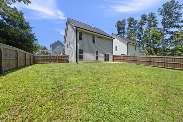 1254 Camden Ave, Durham, NC 27701 - back of house with a fenced backyard