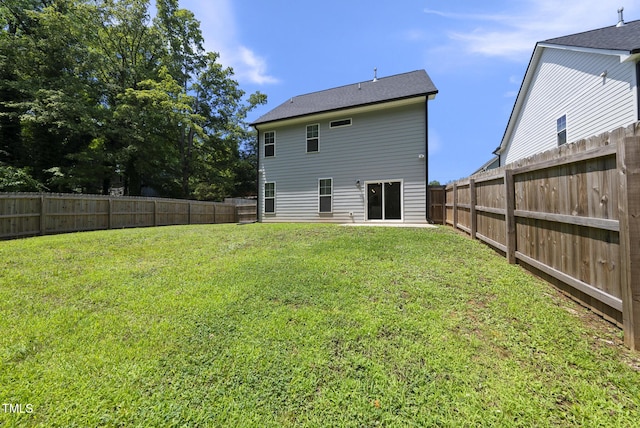 1254 Camden Ave, Durham, NC 27701 - back of house with a fenced backyard