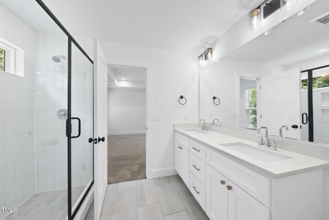 1254 Camden Ave, Durham, NC 27701 - bathroom with double vanity and a shower stall