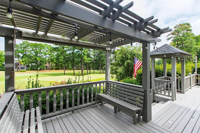 2944 Ballybunion Way, Raleigh, NC 27613 - wooden terrace featuring view of golf course, a pergola, view of scattered trees, a gazebo, and a lawn