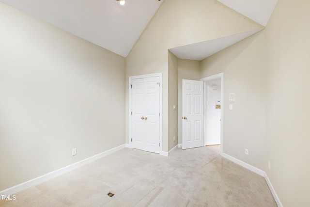 2944 Ballybunion Way, Raleigh, NC 27613 - unfurnished bedroom with high vaulted ceiling and light colored carpet