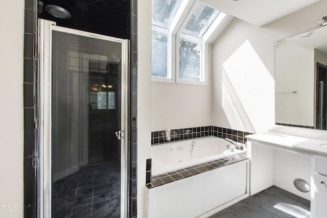 2944 Ballybunion Way, Raleigh, NC 27613 - full bathroom featuring a jetted tub, a stall shower, and vanity