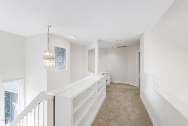 2944 Ballybunion Way, Raleigh, NC 27613 - hall featuring light carpet and a chandelier