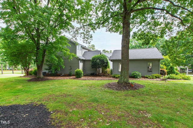 2944 Ballybunion Way, Raleigh, NC 27613 - view of front of property with a front yard and a shingled roof