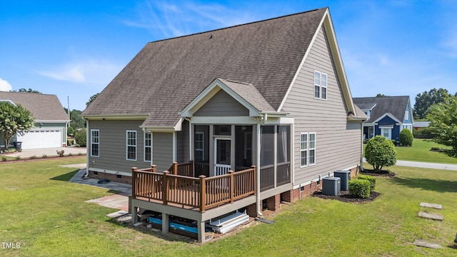 1012 Tavernier Knoll Ln, Raleigh, NC 27603 - rear view of property featuring a sunroom, a lawn, a shingled roof, and a deck