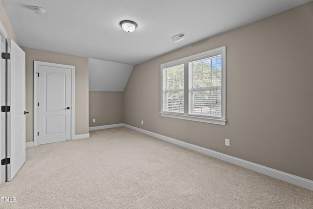 1012 Tavernier Knoll Ln, Raleigh, NC 27603 - bonus room featuring light carpet and lofted ceiling
