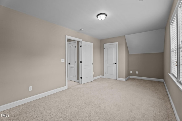 1012 Tavernier Knoll Ln, Raleigh, NC 27603 - unfurnished bedroom with carpet and multiple windows