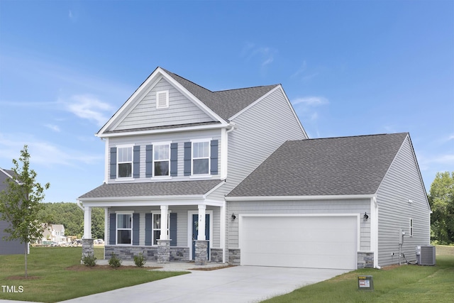 34 Mable Ct Unit 22, Lillington, NC 27546 - view of front of home with a porch, an attached garage, concrete driveway, a front yard, and roof with shingles