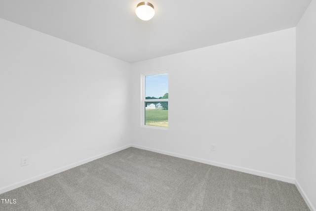 34 Mable Ct Unit 22, Lillington, NC 27546 - empty room featuring carpet floors and baseboards