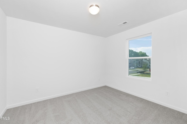 34 Mable Ct Unit 22, Lillington, NC 27546 - carpeted empty room featuring baseboards