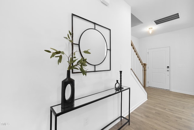 34 Mable Ct Unit 22, Lillington, NC 27546 - stairway featuring wood finished floors and baseboards