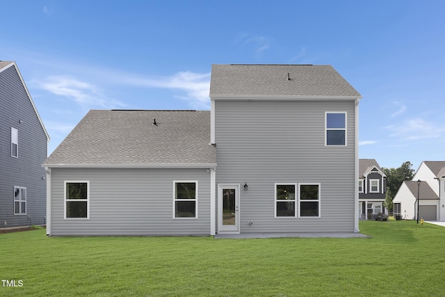 34 Mable Ct Unit 22, Lillington, NC 27546 - rear view of property with a lawn and a patio area