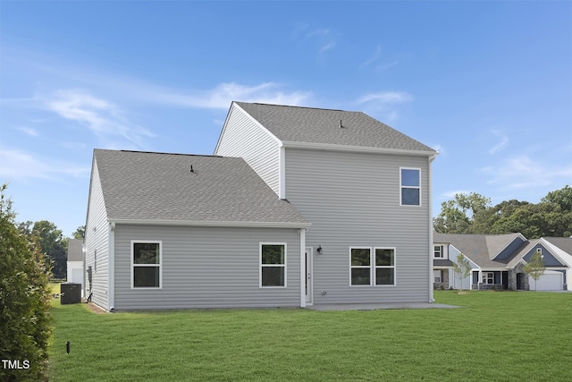 34 Mable Ct Unit 22, Lillington, NC 27546 - rear view of property with a yard and a shingled roof