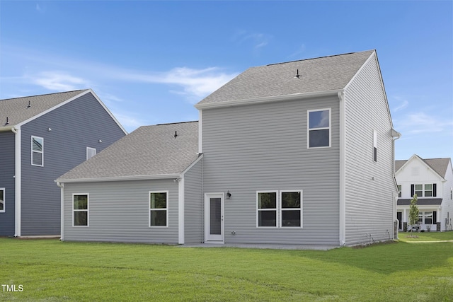 34 Mable Ct Unit 22, Lillington, NC 27546 - rear view of property featuring a lawn