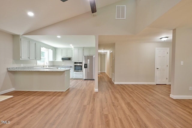 369 Historic Village Dr, Roxboro, NC 27574 - kitchen featuring stainless steel appliances, a peninsula, light wood-style floors, recessed lighting, and open floor plan