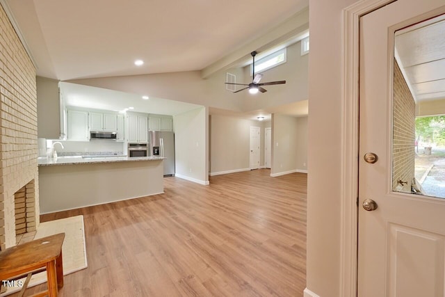 369 Historic Village Dr, Roxboro, NC 27574 - kitchen with appliances with stainless steel finishes, light wood-style floors, ceiling fan, a peninsula, and recessed lighting