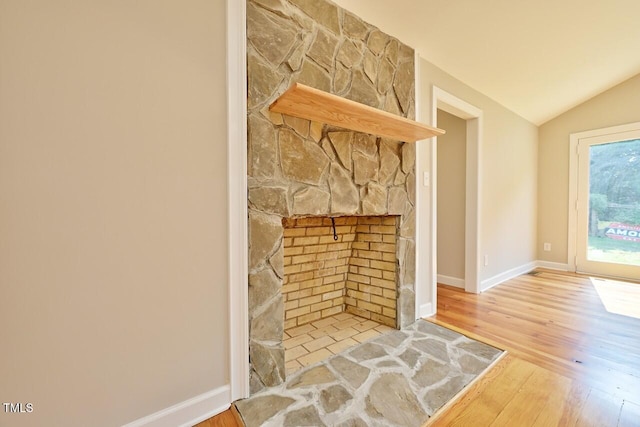 369 Historic Village Dr, Roxboro, NC 27574 - detailed view of wood finished floors and a fireplace