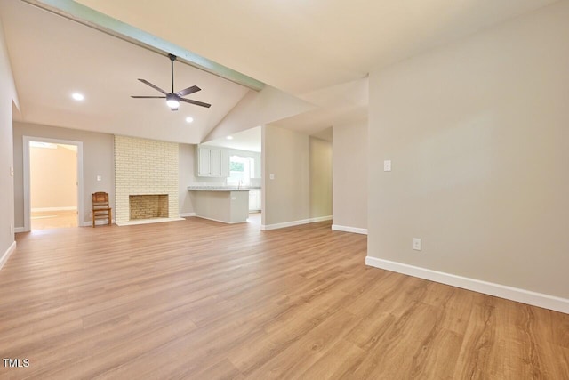 369 Historic Village Dr, Roxboro, NC 27574 - unfurnished living room featuring ceiling fan, light wood-style flooring, recessed lighting, and a fireplace