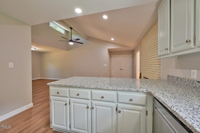 369 Historic Village Dr, Roxboro, NC 27574 - kitchen with stainless steel dishwasher, a ceiling fan, a peninsula, light wood-style floors, and white cabinetry