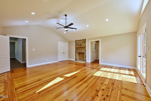 369 Historic Village Dr, Roxboro, NC 27574 - unfurnished living room featuring lofted ceiling, plenty of natural light, a ceiling fan, light wood-style flooring, and recessed lighting