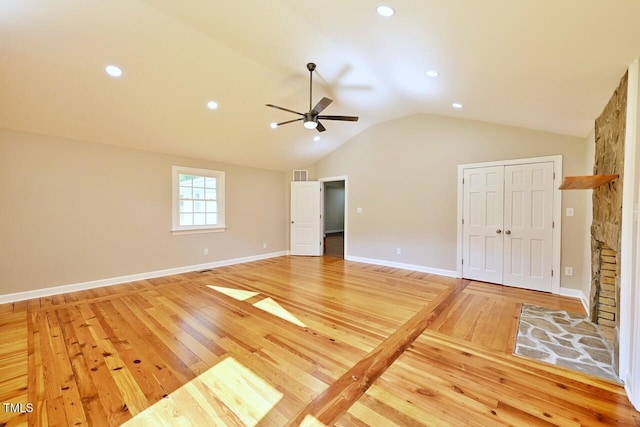 369 Historic Village Dr, Roxboro, NC 27574 - unfurnished bedroom with light wood-style floors, vaulted ceiling, recessed lighting, a closet, and ceiling fan
