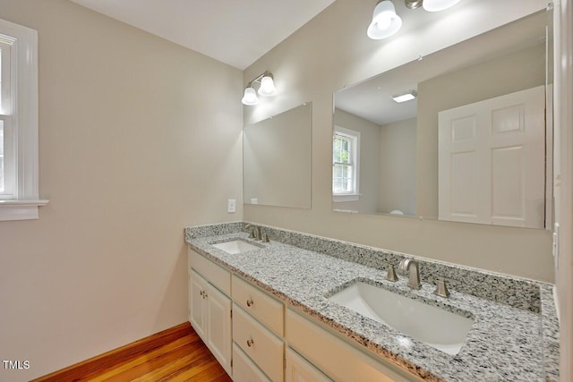 369 Historic Village Dr, Roxboro, NC 27574 - full bath featuring double vanity and wood finished floors