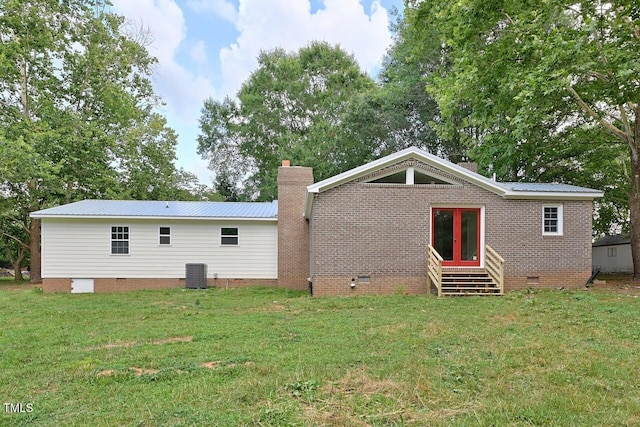 369 Historic Village Dr, Roxboro, NC 27574 - back of house featuring crawl space, entry steps, a yard, and a chimney