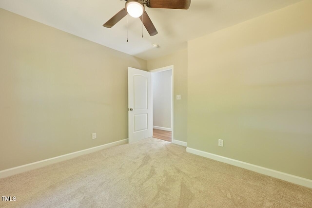 369 Historic Village Dr, Roxboro, NC 27574 - carpeted empty room featuring baseboards and a ceiling fan