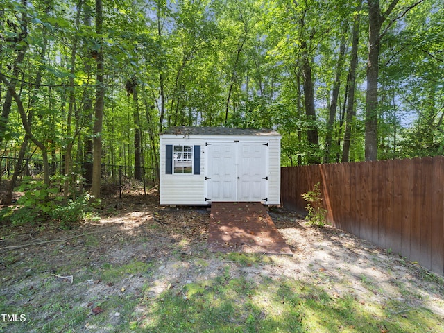 20 Little River Ct, Youngsville, NC 27596 - view of shed featuring a fenced backyard