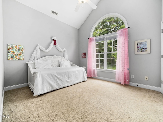 20 Little River Ct, Youngsville, NC 27596 - carpeted bedroom with multiple windows, ceiling fan, and high vaulted ceiling