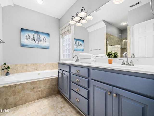 20 Little River Ct, Youngsville, NC 27596 - full bathroom with double vanity, a stall shower, a garden tub, and tile patterned floors