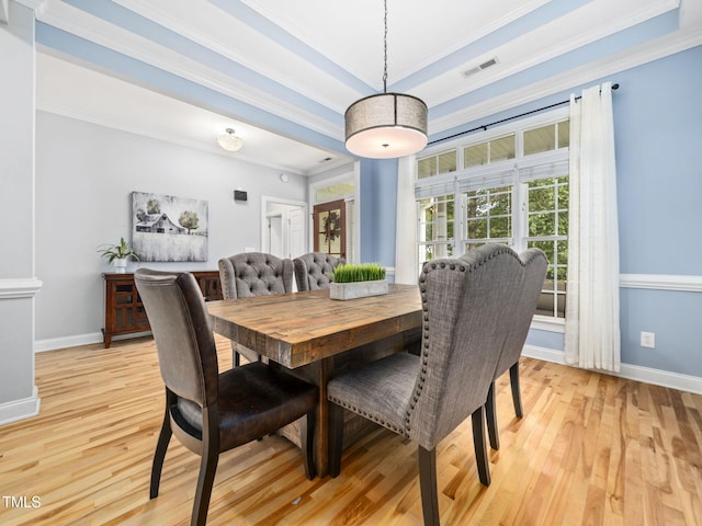 20 Little River Ct, Youngsville, NC 27596 - dining area with light wood-type flooring, ornamental molding, and a raised ceiling