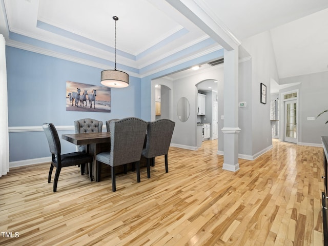 20 Little River Ct, Youngsville, NC 27596 - dining room featuring light wood finished floors, arched walkways, and ornamental molding