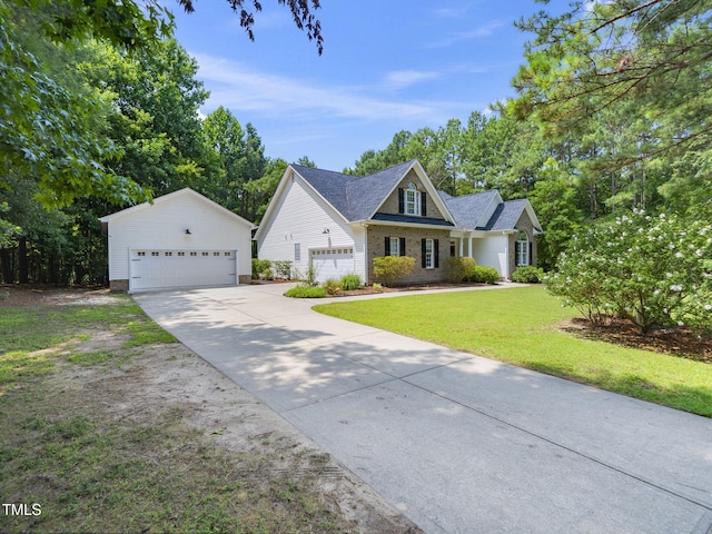 20 Little River Ct, Youngsville, NC 27596 - view of front facade with a front lawn and a garage