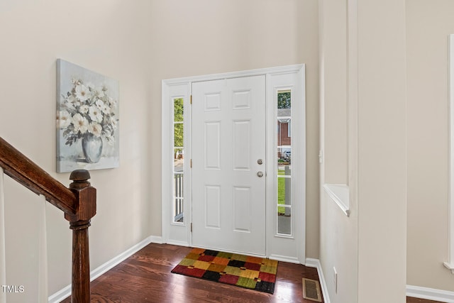 1201 Woodlands Creek Way, Apex, NC 27502 - entryway featuring dark wood-style flooring and a towering ceiling