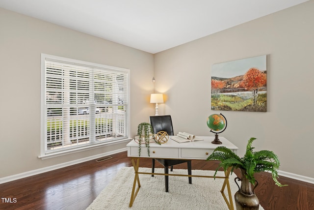 1201 Woodlands Creek Way, Apex, NC 27502 - home office featuring baseboards and wood finished floors