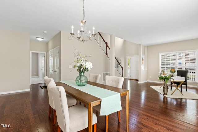 1201 Woodlands Creek Way, Apex, NC 27502 - dining room featuring stairway, a chandelier, and dark wood finished floors