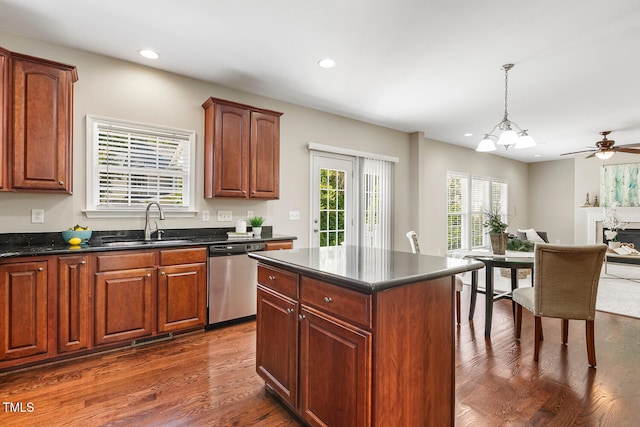 1201 Woodlands Creek Way, Apex, NC 27502 - kitchen featuring dishwasher, dark wood-style flooring, recessed lighting, open floor plan, and a kitchen island