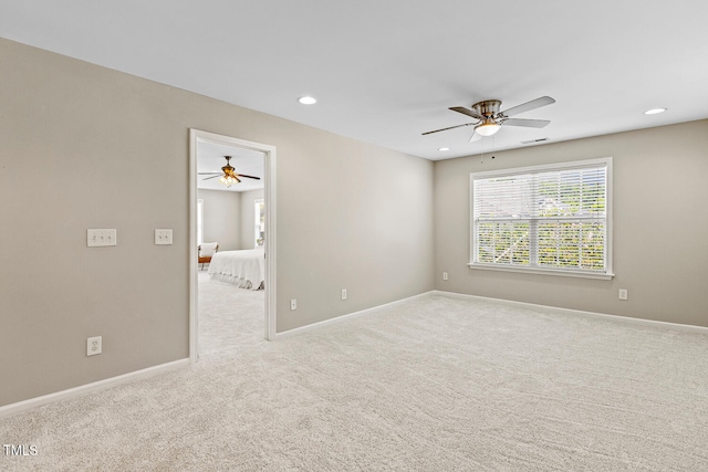 1201 Woodlands Creek Way, Apex, NC 27502 - empty room featuring ceiling fan, carpet flooring, and recessed lighting