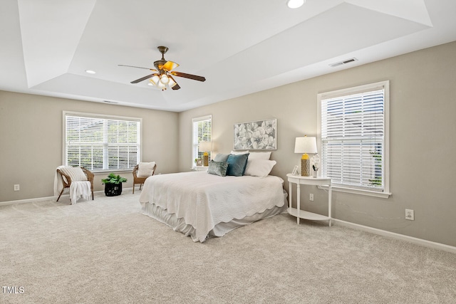 1201 Woodlands Creek Way, Apex, NC 27502 - bedroom with a tray ceiling, carpet, ceiling fan, and recessed lighting