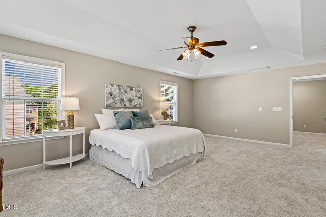 1201 Woodlands Creek Way, Apex, NC 27502 - bedroom featuring a raised ceiling, carpet floors, ceiling fan, and recessed lighting