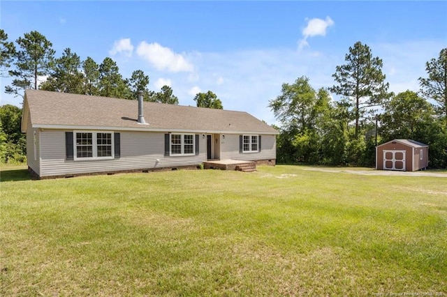 1271 Nutgrass Rd, Bunnlevel, NC 28323 - view of front facade featuring a storage shed, crawl space, a front yard, and a garage