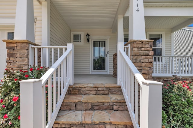 2714 Magnolia Tree Ln, Durham, NC 27703 - doorway to property featuring a porch