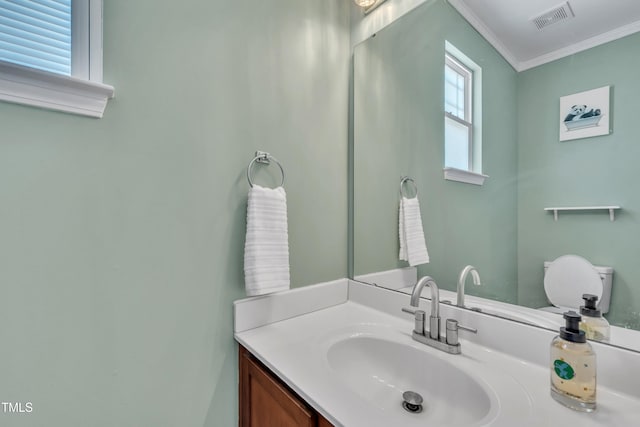 2714 Magnolia Tree Ln, Durham, NC 27703 - half bathroom with vanity and ornamental molding
