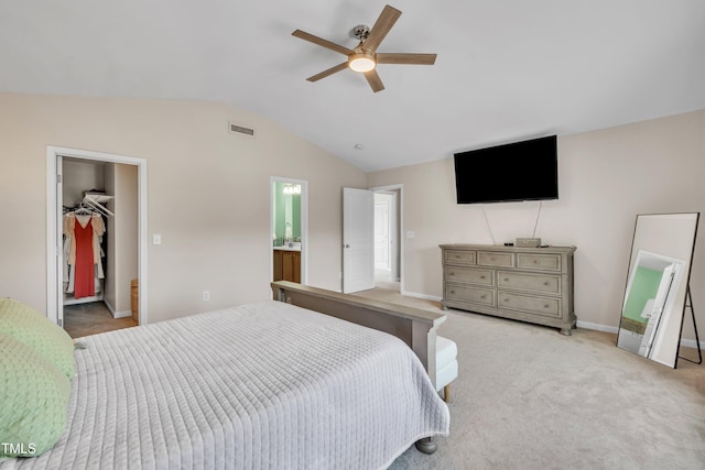 2714 Magnolia Tree Ln, Durham, NC 27703 - bedroom with vaulted ceiling, light carpet, a spacious closet, and ceiling fan