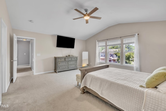 2714 Magnolia Tree Ln, Durham, NC 27703 - bedroom with lofted ceiling, light colored carpet, and a ceiling fan