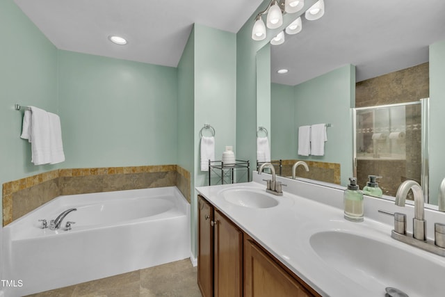 2714 Magnolia Tree Ln, Durham, NC 27703 - full bath featuring a garden tub, a stall shower, double vanity, and recessed lighting