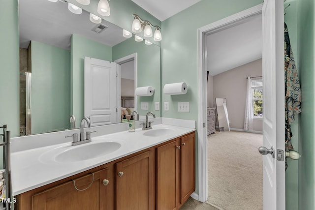 2714 Magnolia Tree Ln, Durham, NC 27703 - full bath with double vanity and vaulted ceiling